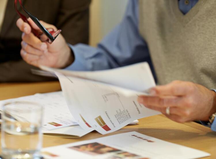 Financial Advisor going over paperwork with client